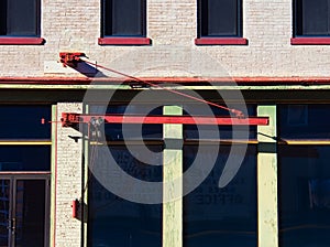 Freight handing crane hoist on a old building