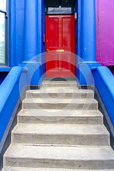 Brightly colored front entrance to a London home