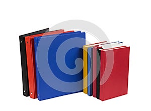 Brightly Colored Notebooks and School Books Isolated on White