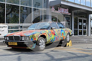 Brightly colored old museum car