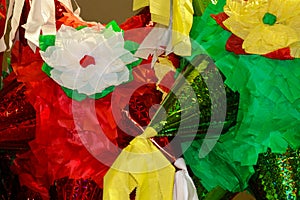 Brightly colored piÃ±ata ready to fill with candy and small toys for a Mexican celebration - Background - Closeup