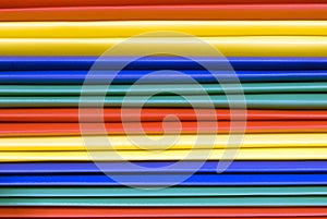 Brightly Colored Plastic File Folders Background