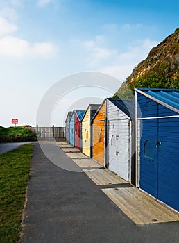 Brightly coloured beach huts, Summerleaze Beach, Bude, Cornwall