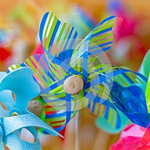 Brightly coloured Japanese childrens wind propellor turbine plastic toy, Kanazawa, Japan