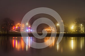 Brightly decorated houses near lake