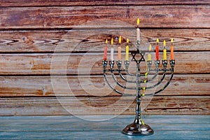 Brightly Glowing Hanukkah Menorah soft focus