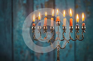 Brightly Glowing Hanukkah Menorah soft focus photo