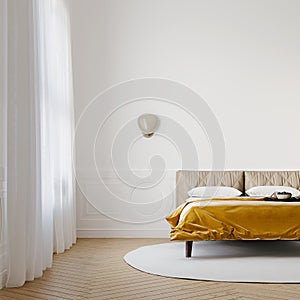 Brightly lit bedroom with vibrant gold color bedspread, mock-up with negative space photo