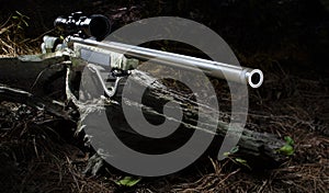 Brightly lit muzzeloading rifle and scope for hunting