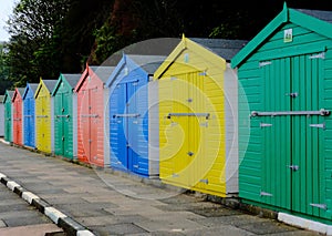 Brightly painted beach huts at the seaside