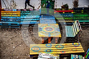 Brightly painted benches and tables along the Danube Canal