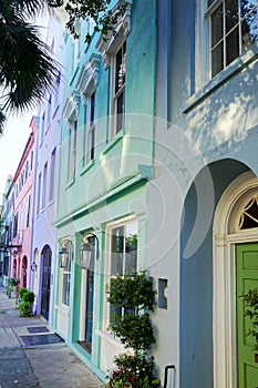 Brightly painted homes known as Rainbow Row on East Bay St in Charleston SC photo