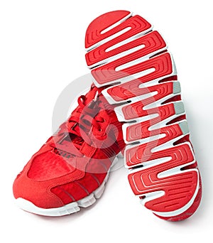 Brightly red trainers.Close up