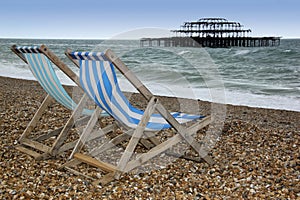 Brighton beach deckchairs west pier sussex england