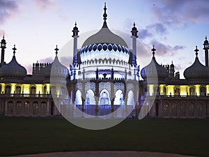 BRIGHTON, ENGLAND- OCTOBER, 4 2017: a floodlit brighton pavilion at dusk in england