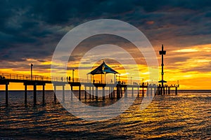 Brighton jetty with people silhouettes