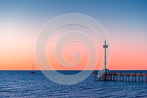 Brighton Jetty with people at sunset