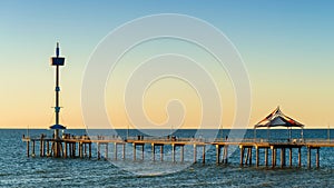 Brighton Jetty with people at sunset