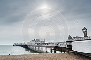 Brighton Pier and beach,off season in the late winter,Brighton,East Sussex,England,United Kingdom
