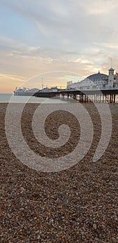 Brighton pier sunset busy Christmas beach pebbles