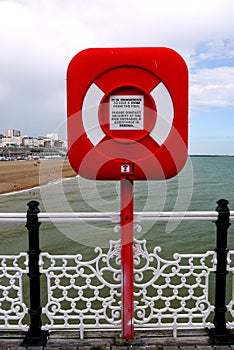 Brighton: red lifesaving ring on pier