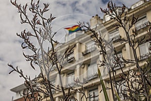 Brighton town - a building and a rainbow flag.