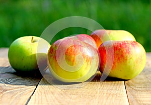 Brights aapples on wooden desk board