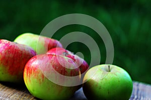 Brights aapples on wooden desk board