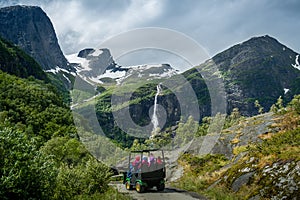 Briksdalsbreen glacier troll car excursion. Briksdal, Norway.