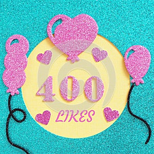 a brilliant banner for posting on a social network about 400 likes with balloons and hearts