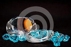 Brilliant cut green diamonds photographed in the studio with a colored background