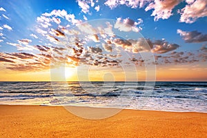 Brilliant ocean beach sunrise.