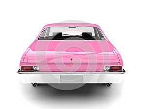 Brilliant pink restored vintage fast muscle car - back view photo