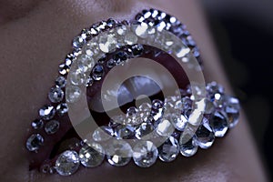 Brilliant smile teeth jewelry macro close