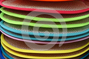 Brims of hats stack.