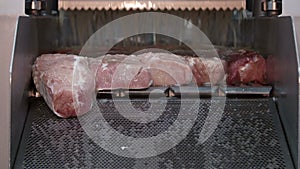 Brine injection of pork in a meat processing factory
