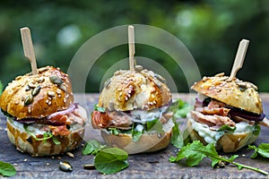 Brioche buns with salmon and salad