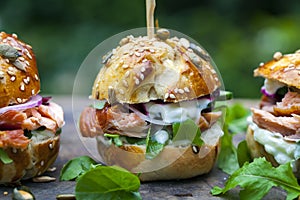 Brioche buns with salmon and salad