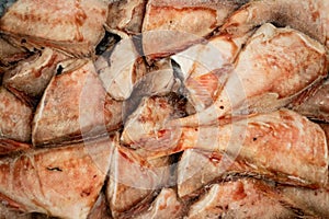 Briquette frozen sea bass for trade in the fish market