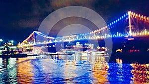 Brisbane - Colourful lights adorn Storey Bridge in Brisbane Qld Australia