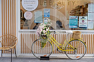 Yellow Bicycle Filled With Flowers