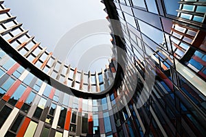 Brise soleil sun breakers on modern office building facade, global warming, sustainable living concept, heat protection