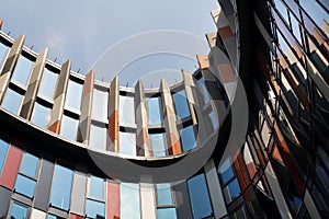 Brise soleil sun breakers on modern office building facade, global warming, sustainable living concept, heat protection