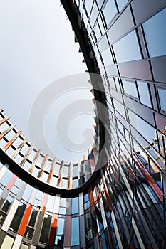 Brise soleil sun breakers on modern office building facade, global warming, sustainable living concept, heat protection