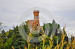 Brisighella clock tower under an overcast sky