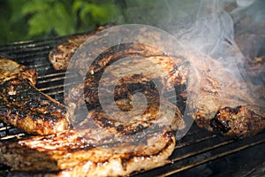 Brisket steaks on a grill