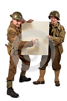 Bristish and american soldier show a poster photo