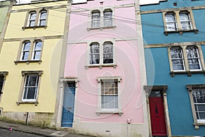 Narrow street with colorful houses in Eastville neighborhood in Bristol city