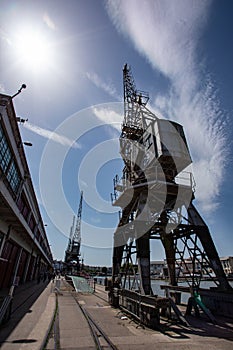 Bristol England UK cranes along the dockside at Princes Wharf