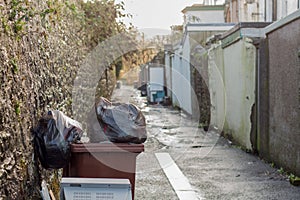 British Backstreet With Waste Bins photo